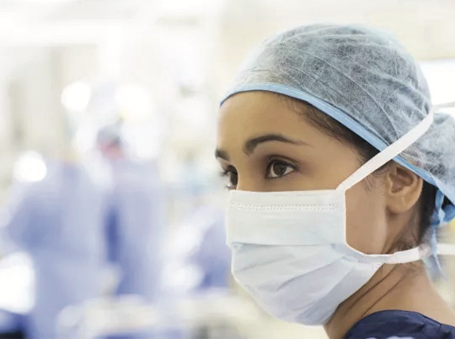 Healthcare professional wearing face protection